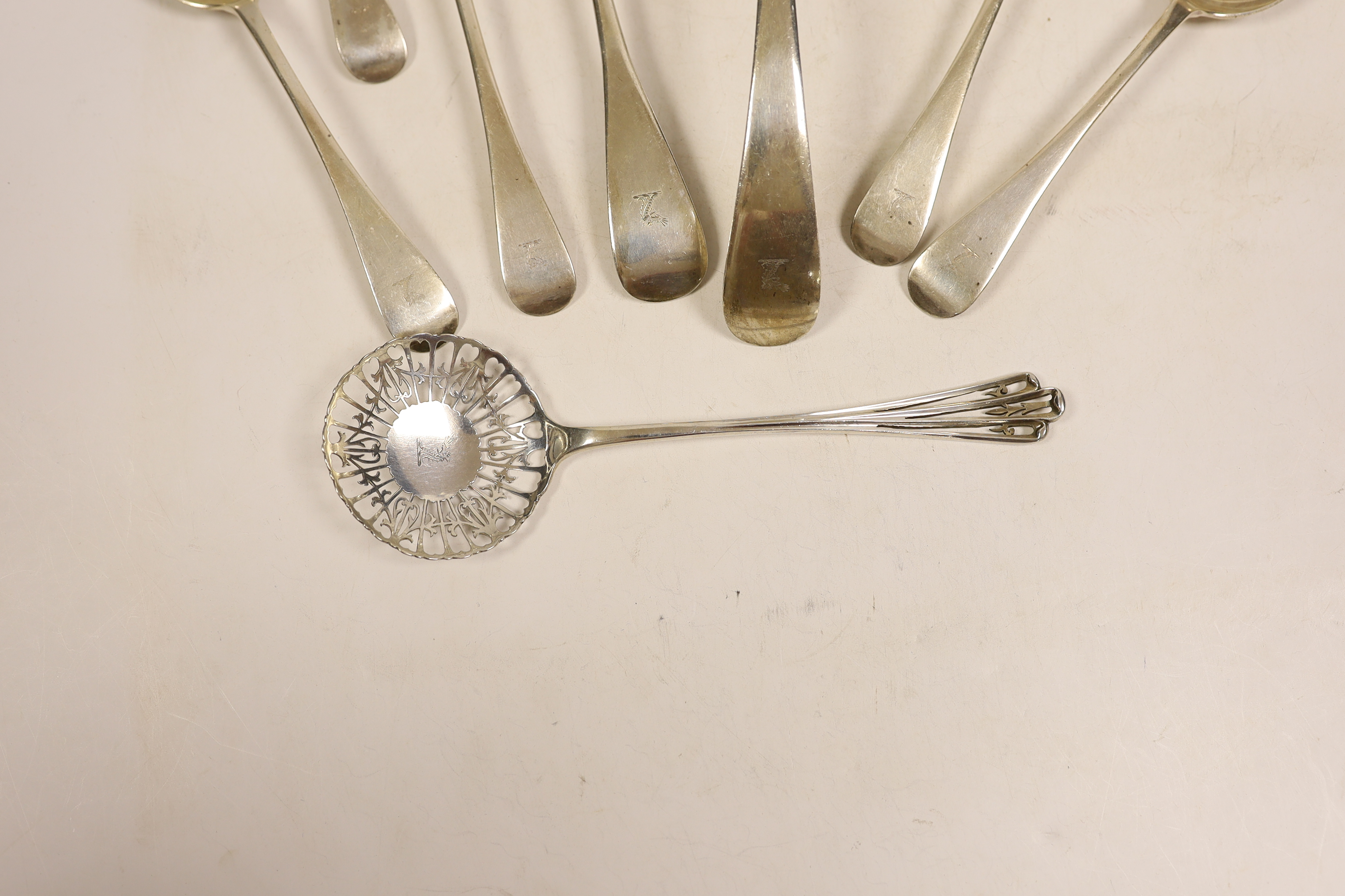 A George V silver Old English pattern soup ladle, basting spoon and set of six soup spoons, John Round & Sons, Sheffield, 1912, together with a pair of silver sifter spoons, same maker, 27.3oz.
